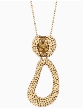 Atelier Swarovski Tigris gold necklace.